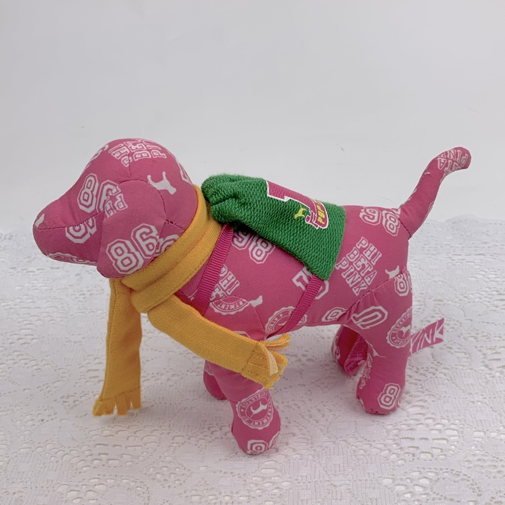Victoriaโs Secret Pink Plush Dog Pink green backpack University Greek Phi Beta